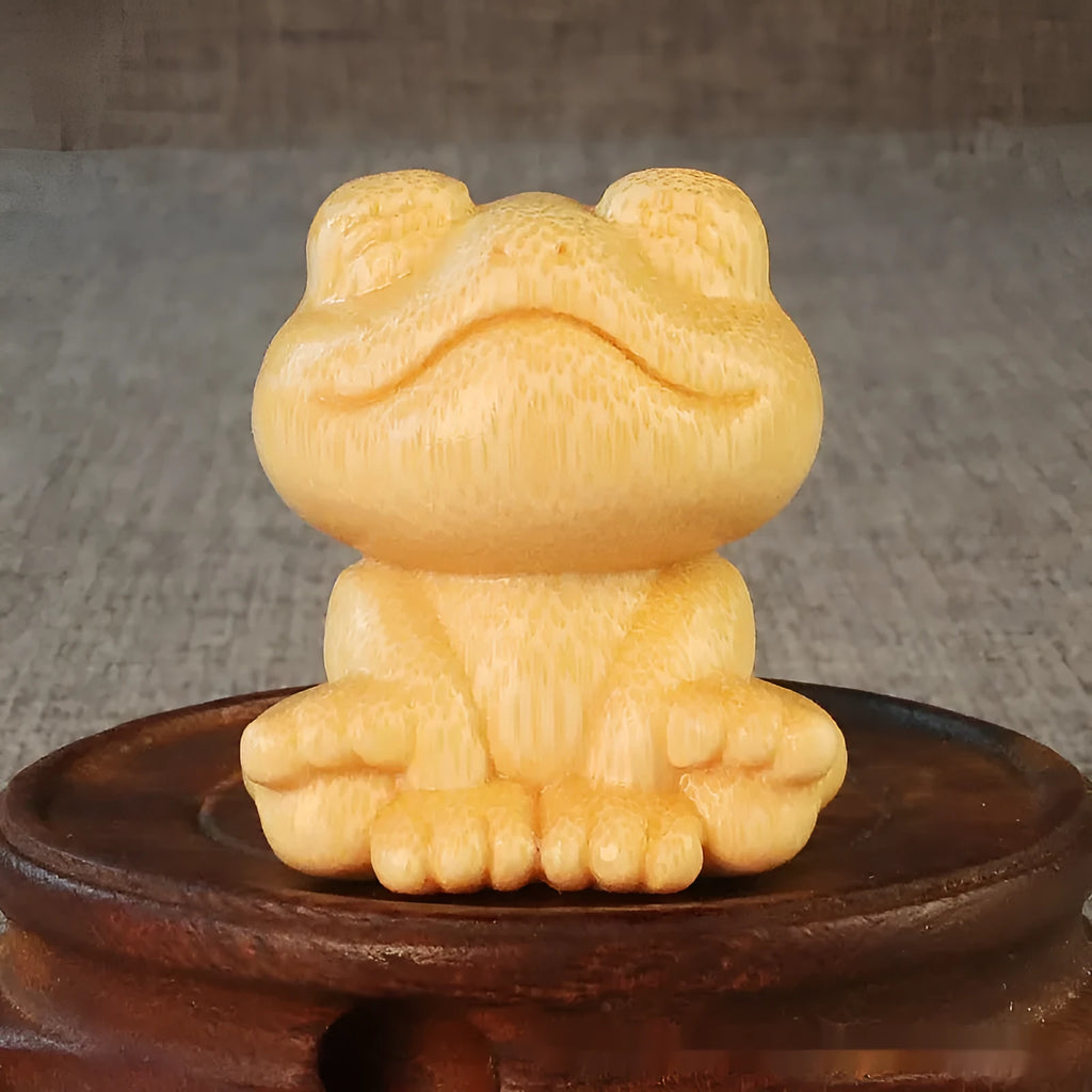 Solid bamboo smiling frog carving ornament measuring 5cm high with cartoon cute style