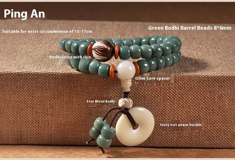 White jade green Bodhi seed bracelet with a safety buckle and lotus charm.
