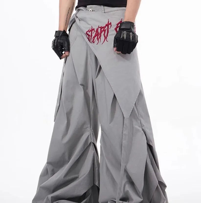 Boy modelling black wide-leg summer pants in a refined Korean style