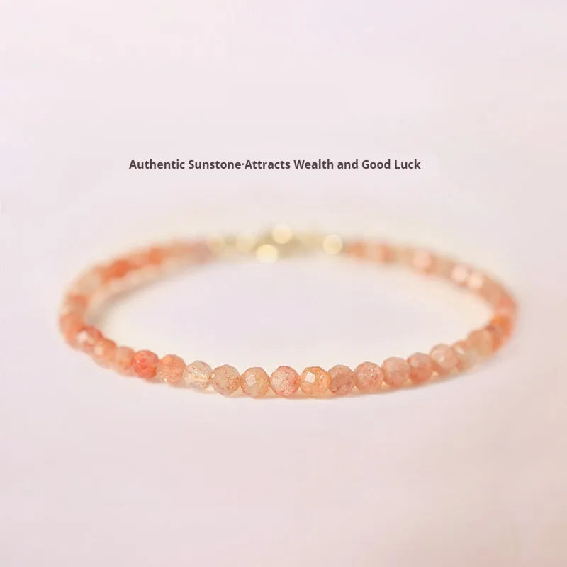 Ultra-thin 3mm sunstone crystal bracelet shown on wrist with natural colour variations