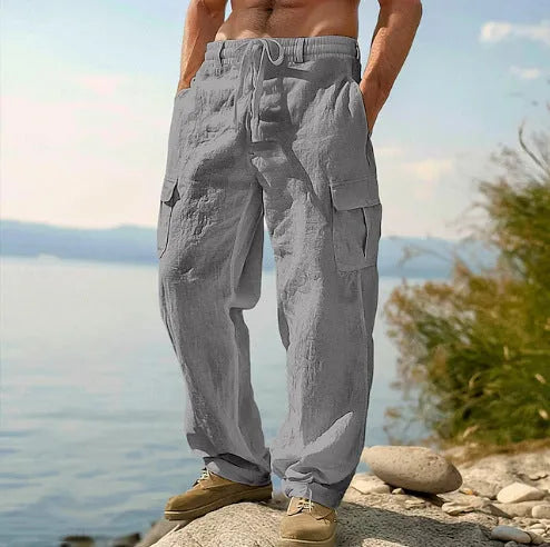Men's loose cotton wide-leg casual trousers in solid colours showing mid-waist and relaxed fit