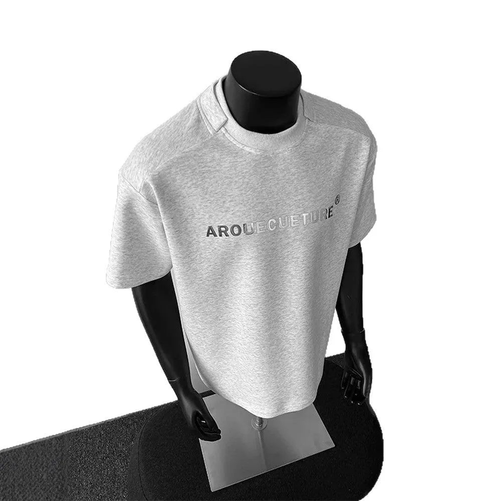 Men's loose short sleeve cotton t-shirt with printed letters in light grey.