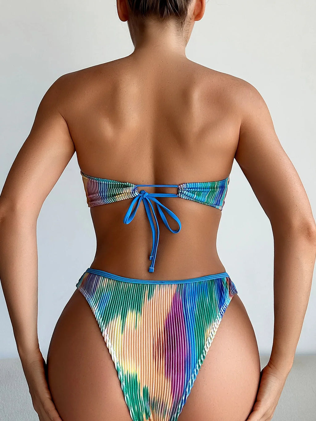 Colour printed polyester tube top bikini set with matching briefs for swimming.
