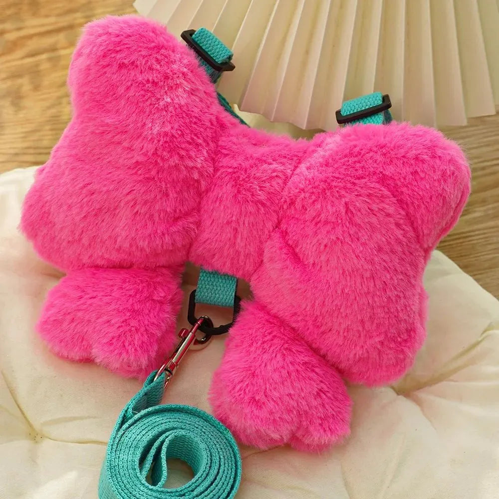Pet bow chest strap traction rope in pink, size M, on a small dog with cute bow on back
