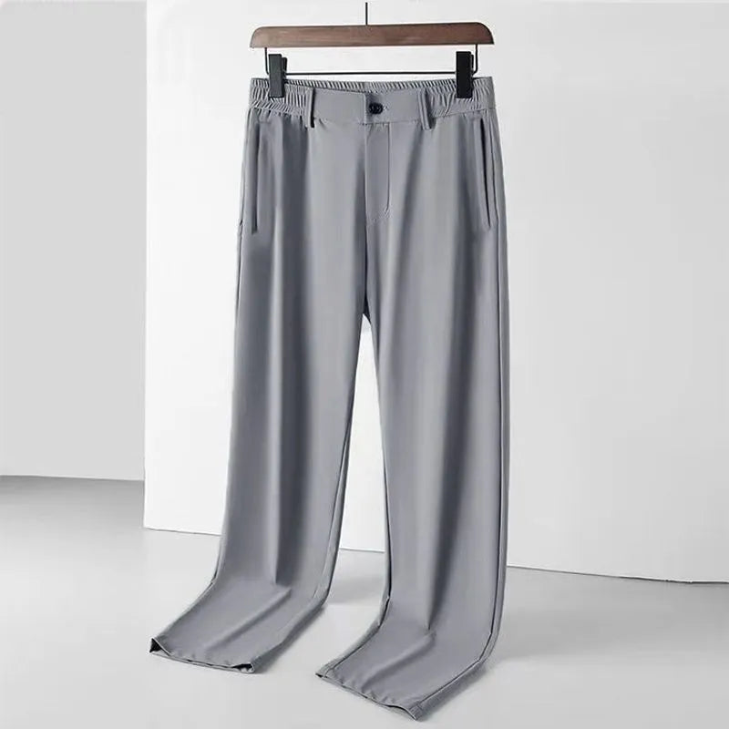 Men's straight-leg ice silk trousers in a loose fit with an elasticated waist, shown in black.