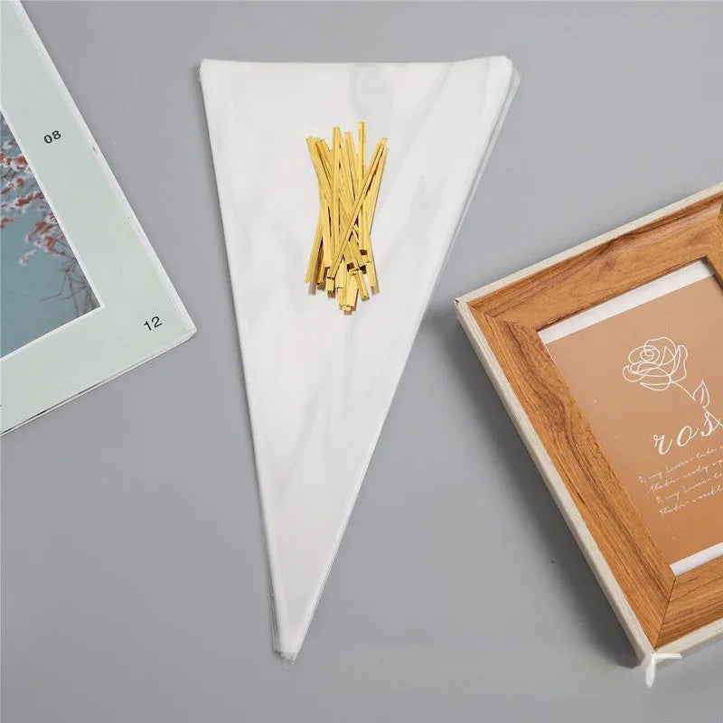 Clear triangle-shaped plastic packaging bag with a silver tie wire, showing three size options.
