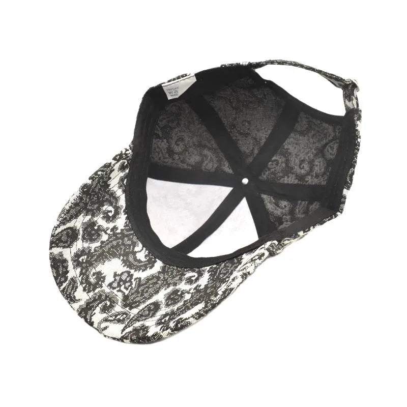 Polyester baseball cap with printed paisley pattern in blue colour showing dome crown design