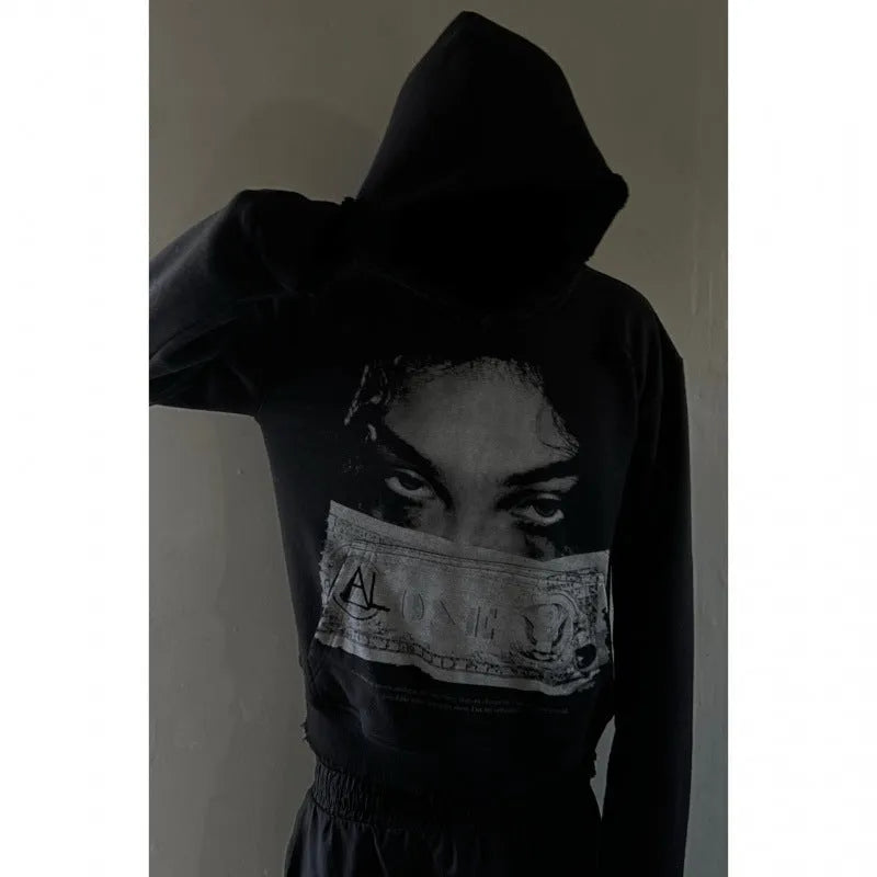Black women's hoodie with cartoon print design in loose fit polyester fabric