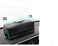 Black PU leather car hanging organiser bag with paper insert for storing documents.