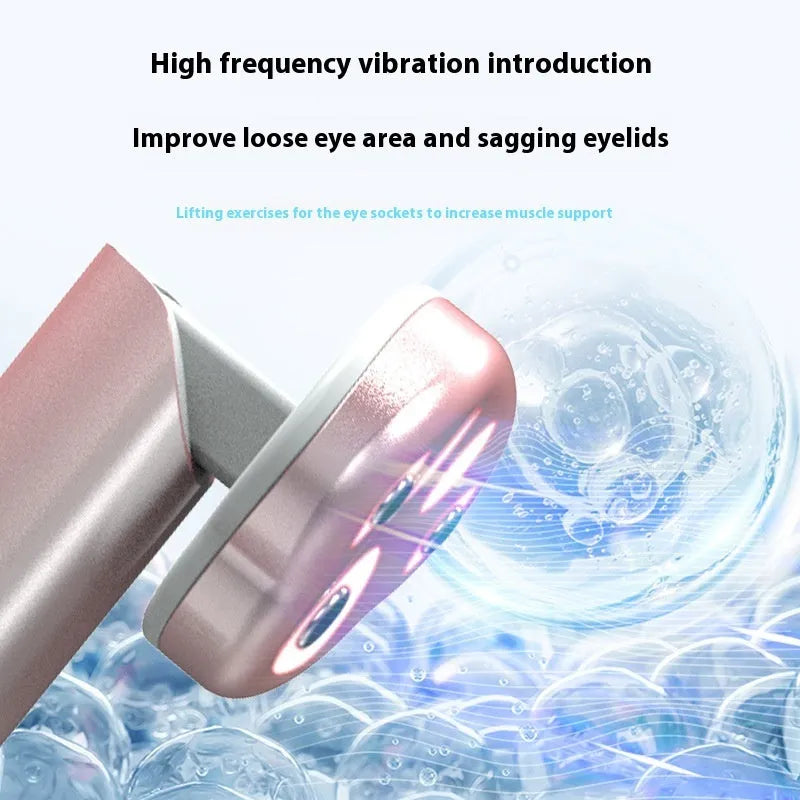 Gradient pink cat's paw shaped eye massager with micro-current technology and charging cable