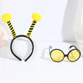 Bees party costume set with black and yellow striped headband and matching glasses