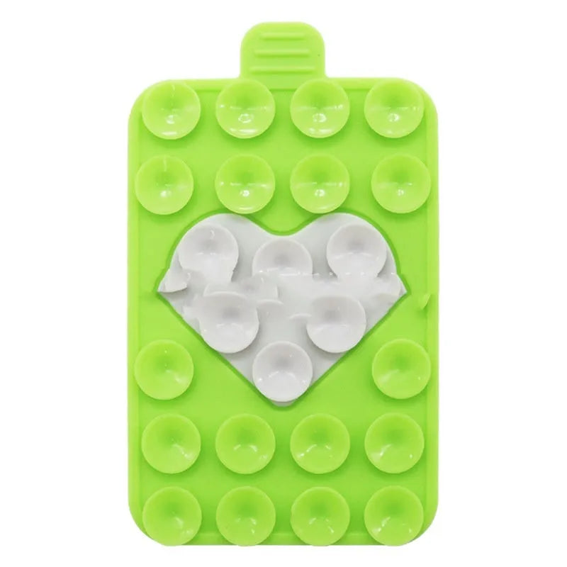 Double sided silicone suction cup phone case holder in gray white, showing hot pressed construction for universal fit on smooth surfaces
