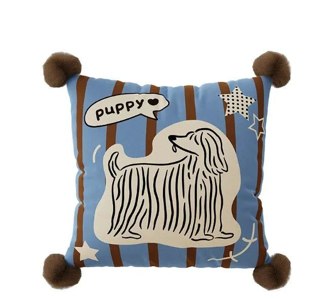 Blue cartoon animal printed sofa cushion pillow on a grey sofa