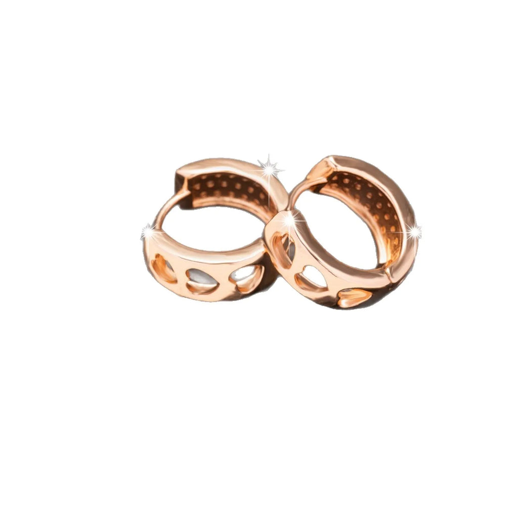 Rose gold women's earrings featuring a hollow heart shape inside a circular frame.