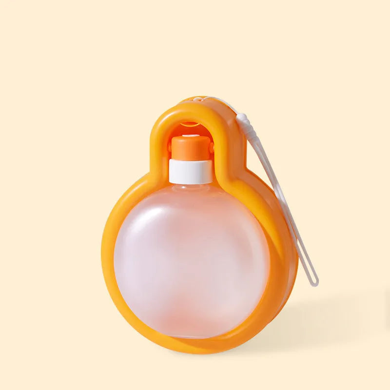 Green portable dog water bottle with fold-out drinking bowl for travel.
