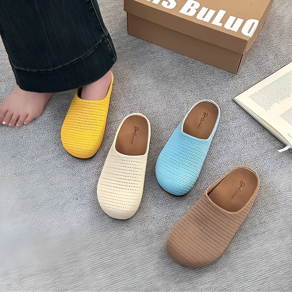Women's baotou boken slippers in beige with a cloth upper and non-slip rubber sole.