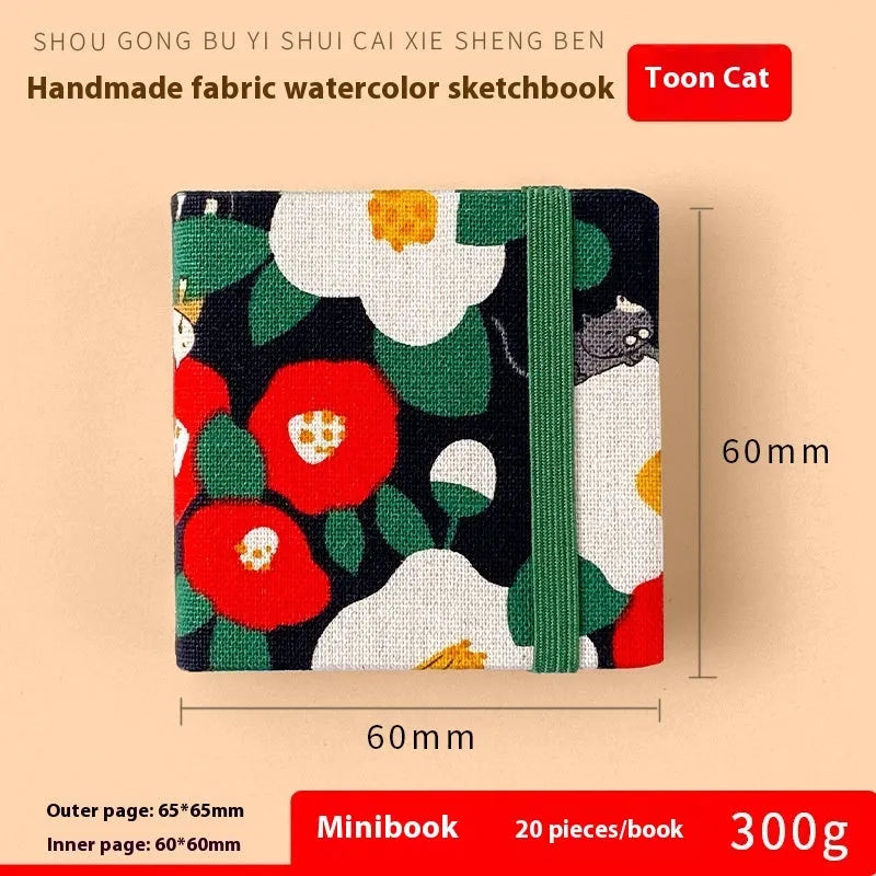 Feiluniao handmade fabric watercolour notebook with cotton paper, 185mm long, shown in a cover design option.
