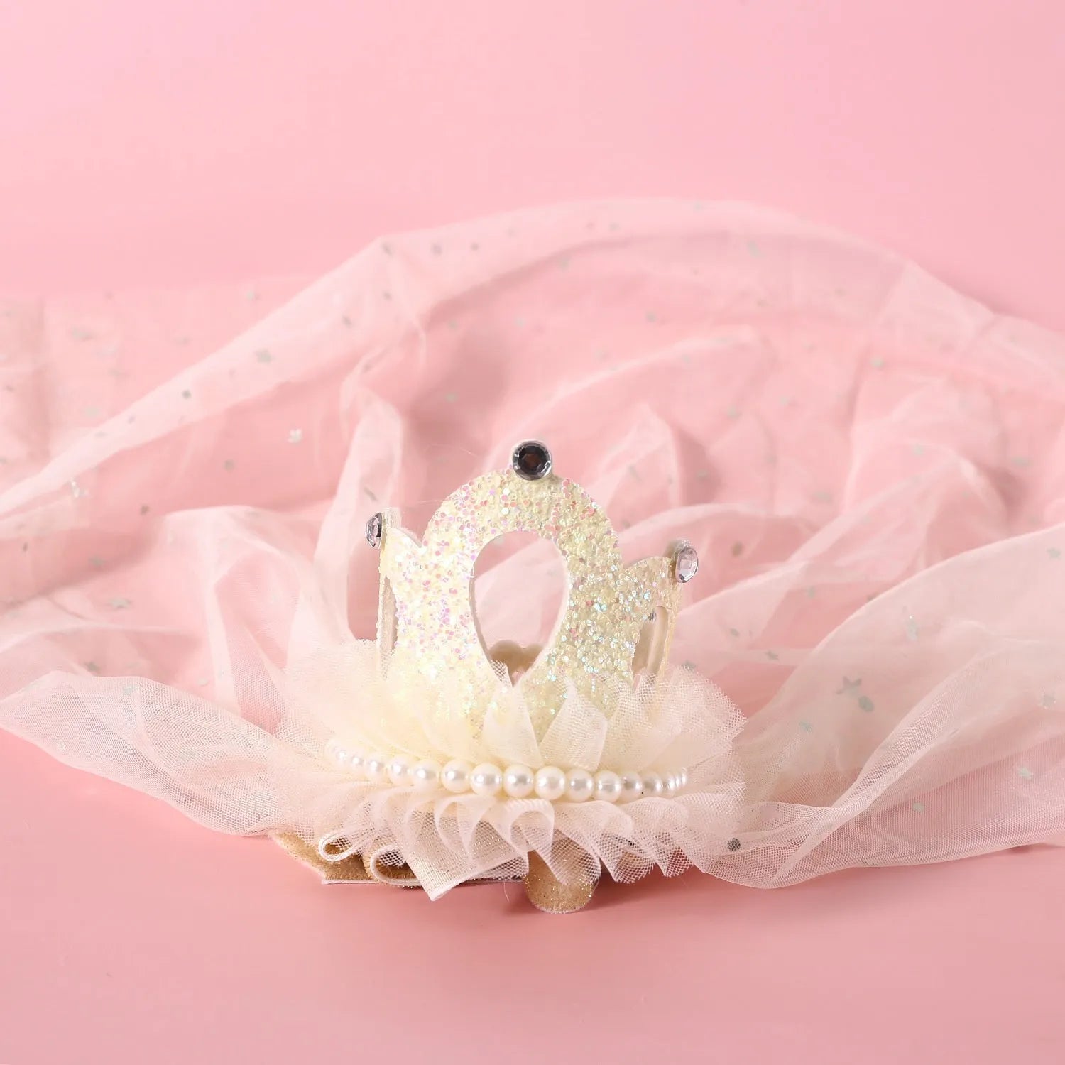Cat wearing princess crown headdress with veil in beige and pink colour options for wedding or party costume