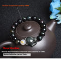 Natural obsidian bracelet with zodiac charm in gold, silver, or black stone styles.
