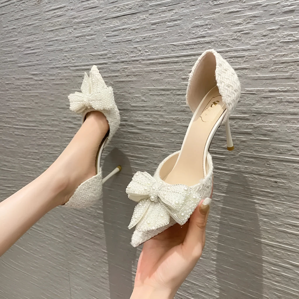 Women's pointed toe pumps with side bow, rhinestone and hollow detail in beige or black, sizes 35-40