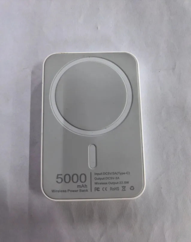 Portable magnetic wireless charger in white with 5000mAh capacity showing compact dimensions