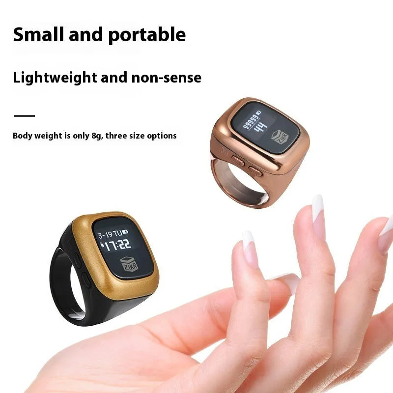 Al-fatiha electronic counter display with black casing shown next to rose gold and silver versions.