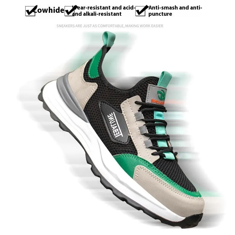 Black and green low-top safety shoes with a mesh panel and plastic steel toe cap on a TPU sole.