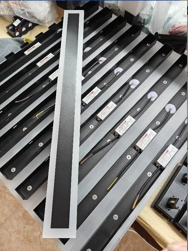 Long straight outdoor LED wall lamp with wrought iron shell for waterproof garden lighting.