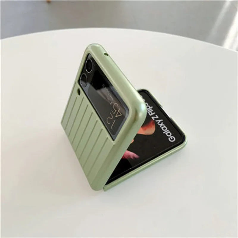 Ultra-thin solid colour flip phone case for Samsung Z Flip3 in black, shown open.