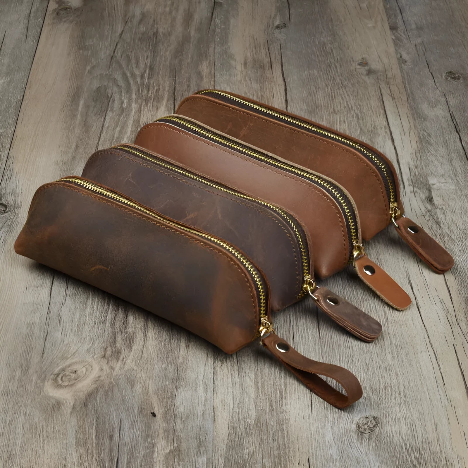 Genuine cowhide leather pencil case with zipper closure measuring 18cm long