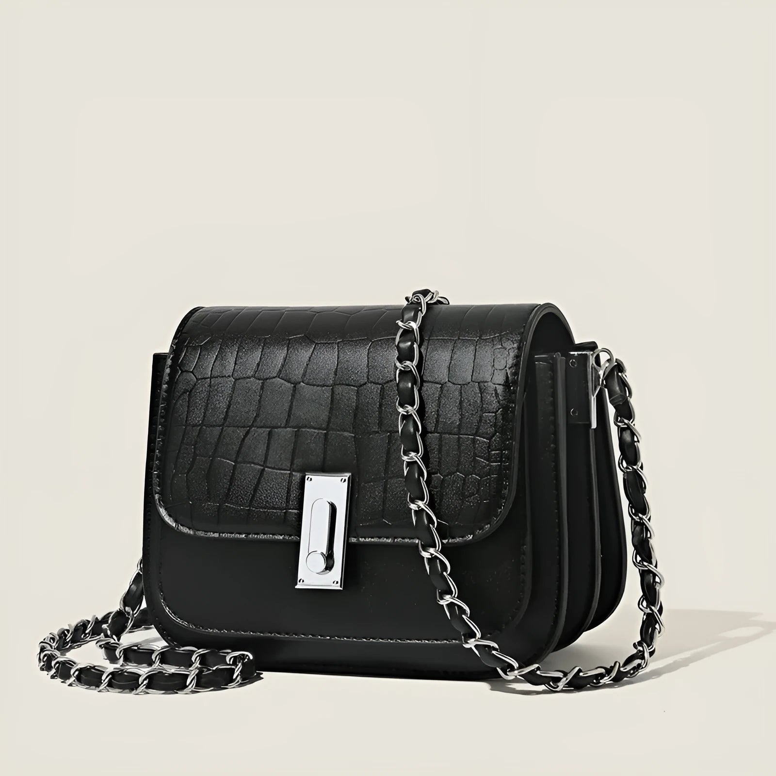 Soft black PU leather women's chain shoulder bag with adjustable strap and square shape.