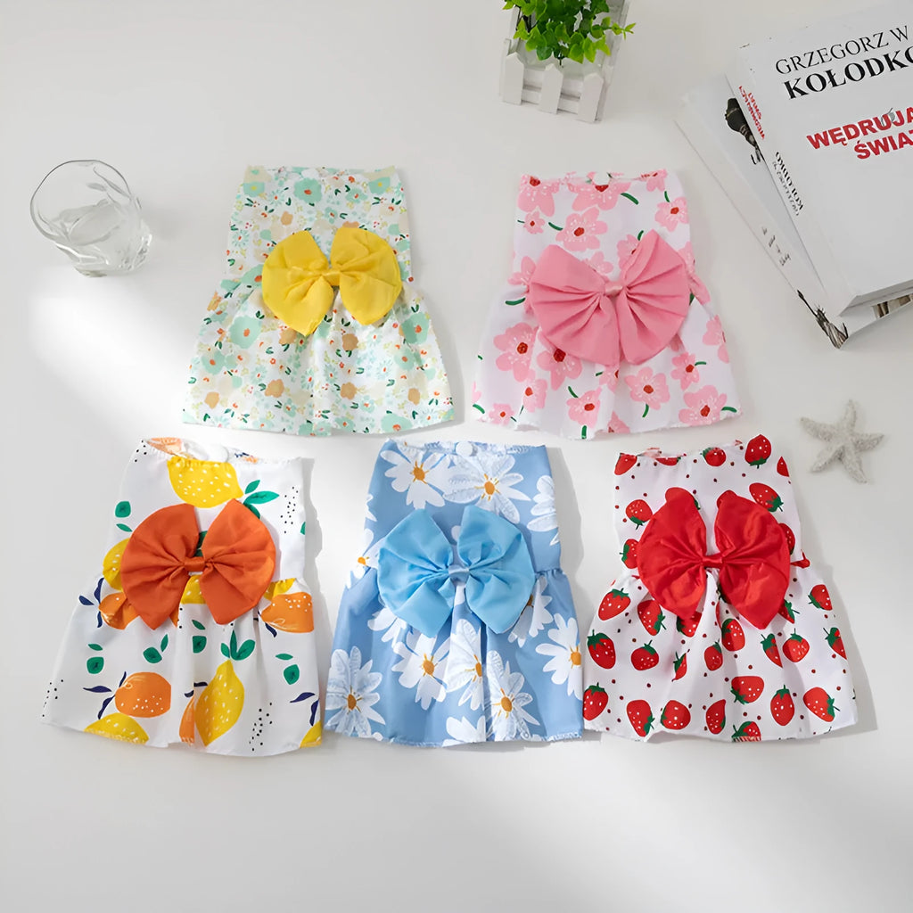 Ultra-thin floral print pet dress for dogs or cats with a large knotted bow at the chest.