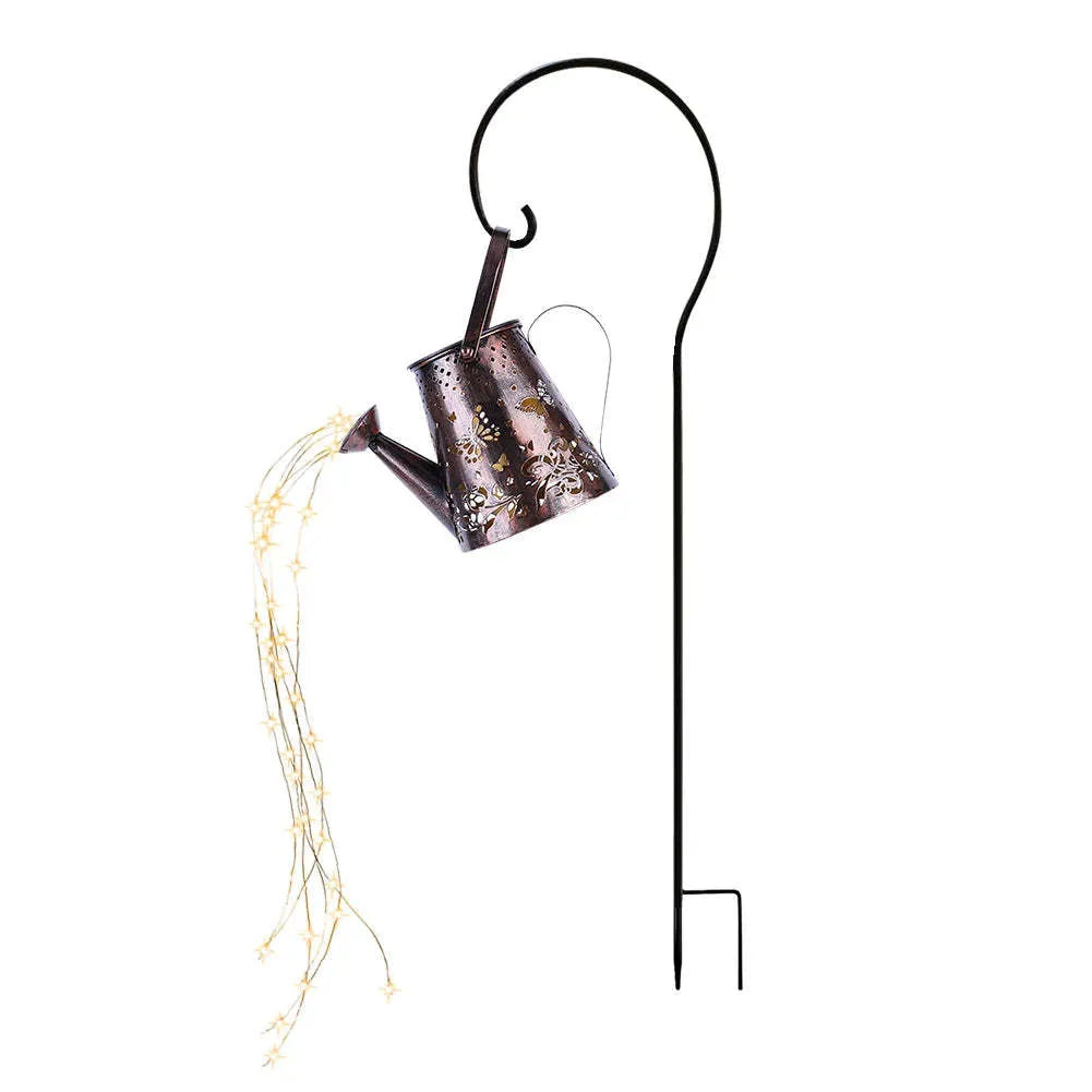 Iron solar garden lamp with tapered butterfly pattern and warm white LED light.