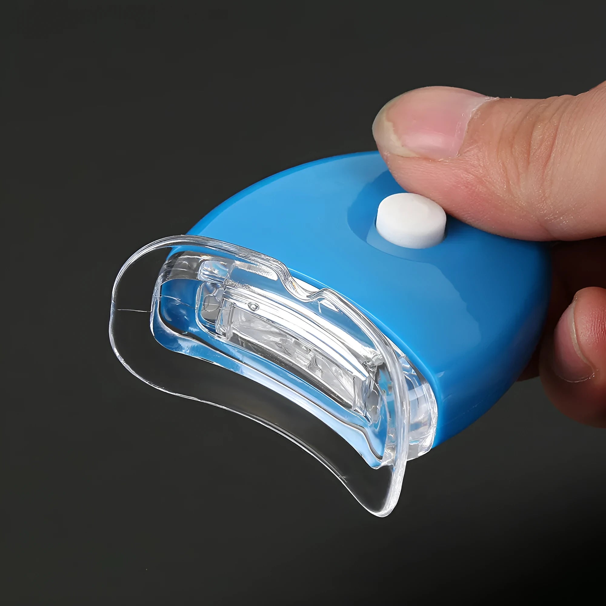 Transparent silicone denture model on a clean surface with natural light showing clear tooth structure