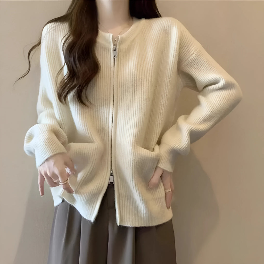 Beige women's cardigan-style sweater coat with long sleeves made from soft viscose.