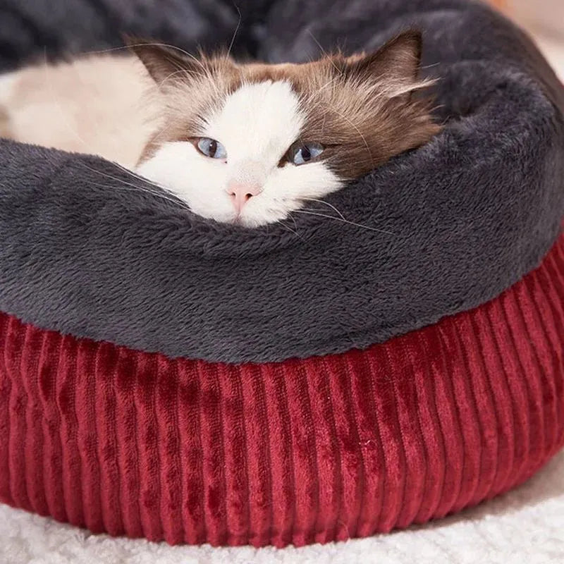 Washable circular cat sofa bed in yellow with plush fabric and non-slip base for calming sleep