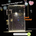 DIY kit components for assembling a snowy landscape night light with LED fairy lights