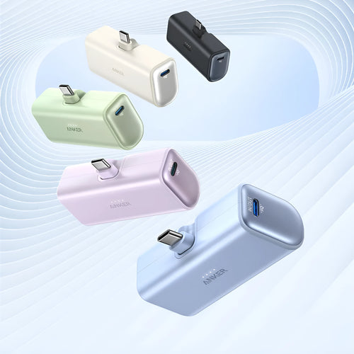 Capsule-shaped 5000mAh power bank in multiple colours showing compact 77x36x25mm size with Type C port