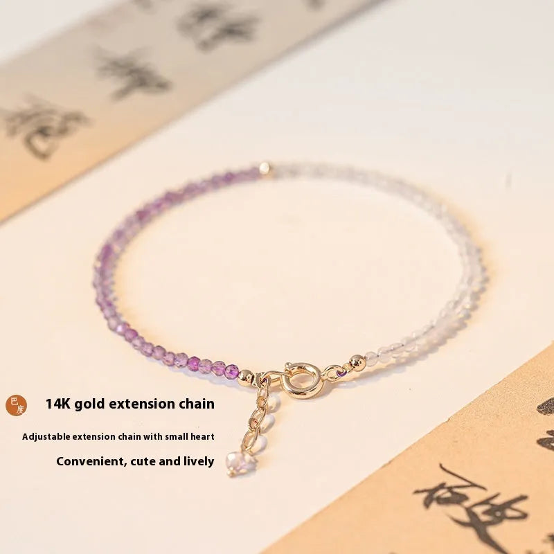 Purple crystal bracelet with 2mm beads in geometric rattan design