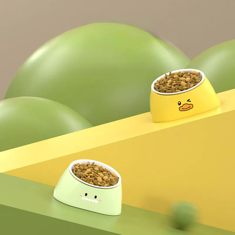 Green tilted stainless steel pet bowl with 15-degree angle for cervical spine protection