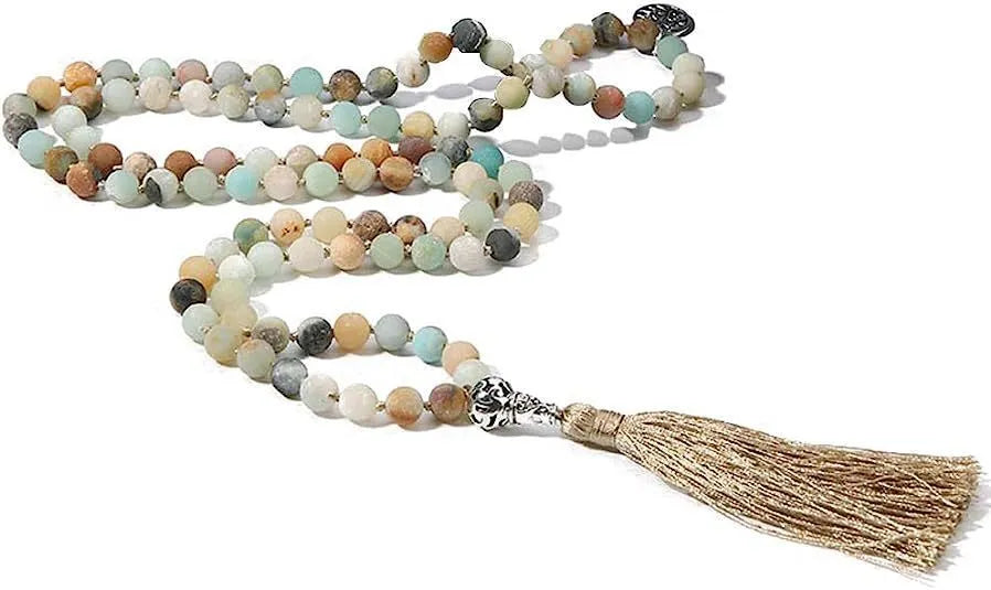 Handmade knotted stone bead necklace with 108 beads, showing geometric design and natural stone colours.