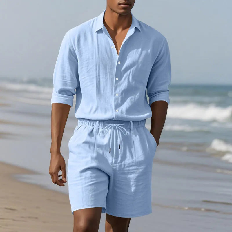 Men's linen beach suit showing long sleeve shirt and matching shorts in light blue colour