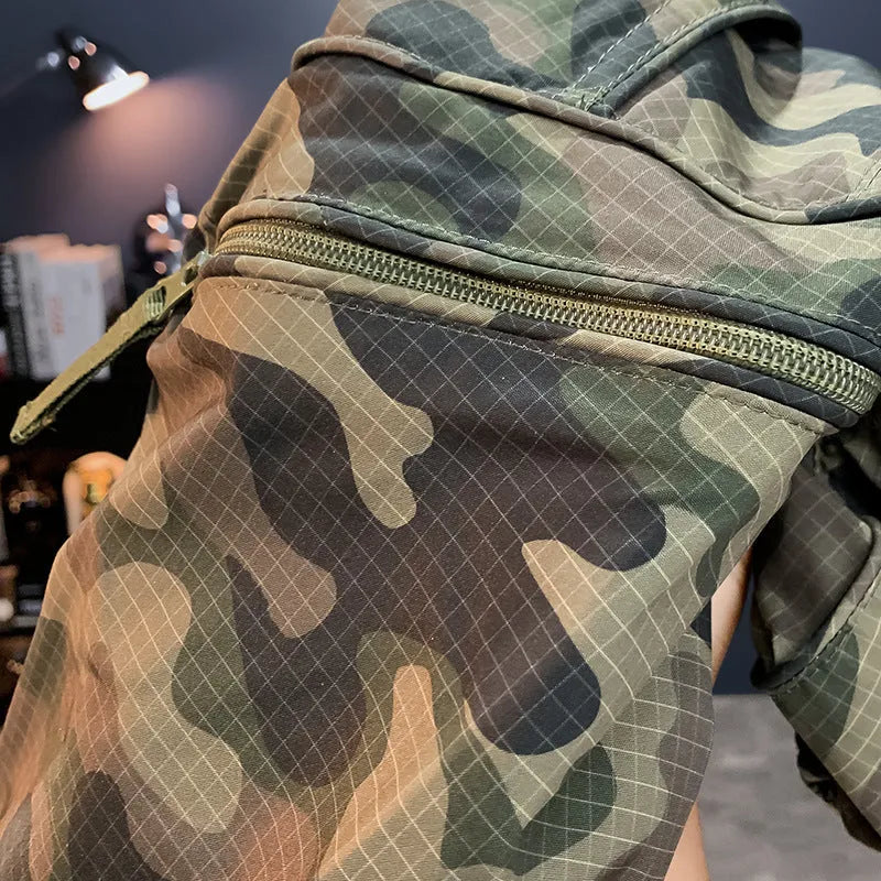 Man wearing loose-fit camouflage cargo shorts with cargo pockets and an elasticated waistband.