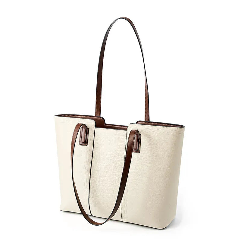 Women's genuine leather commuter bag with internal organisation compartments in horizontal square design