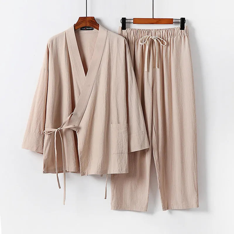 Cardigan-style Hanfu two-piece suit in cotton and linen, shown in apricot colour with shirt-style jacket and trousers.