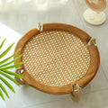 Brown woven rattan pet hammock bed raised off the ground