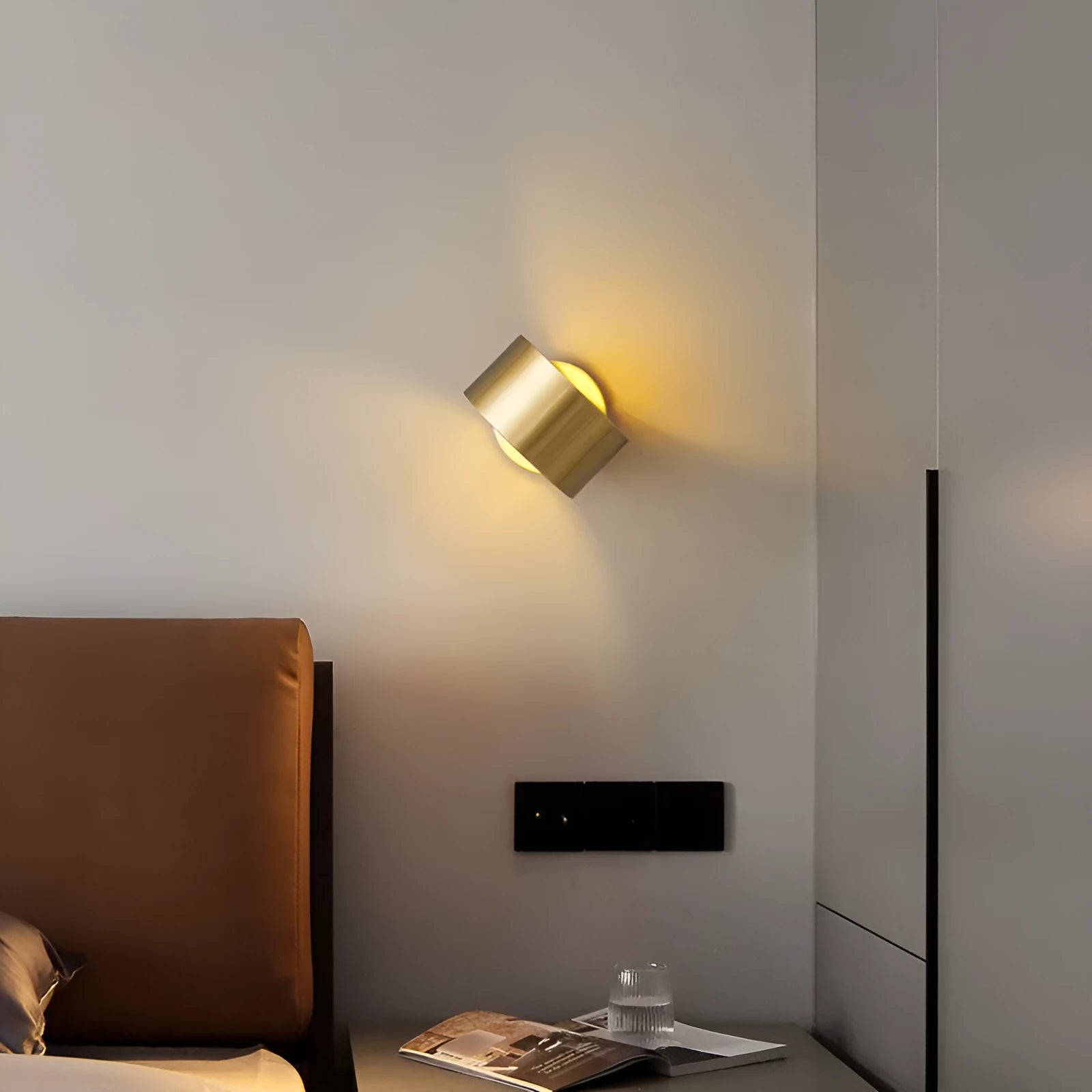 Modern simplicity style copper wall lamp shown in black and gold finish options for living room.
