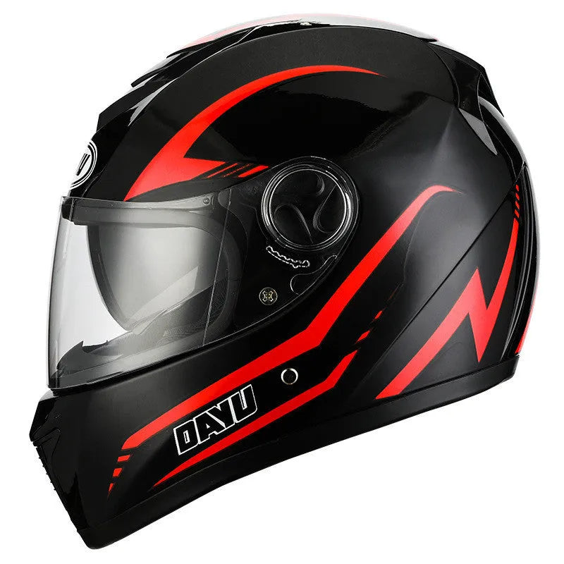 Black and red patterned motorcycle helmet with dual lens safety system