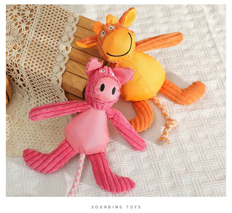 Plush dog toy in cow and pig design with squeaker, 40 x 32cm, orange or pink
