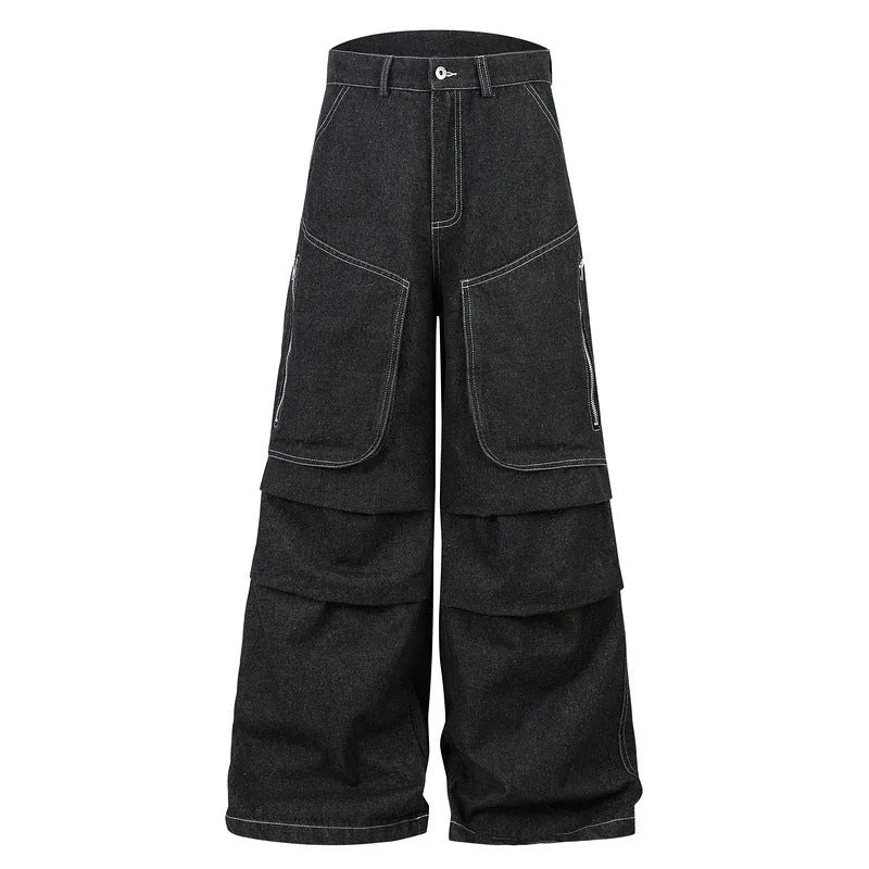Black pleated workwear jeans with multiple pockets showing mid-waist fit and zip placket opening